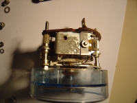  which probably meant next time something was failing, the fuse didn't release, and this resistor overheated, and melted that white drive wheel in the middle...